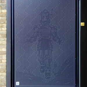 Specialist aluminium fabrication: Tobor the Great character punched into an aluminium gate